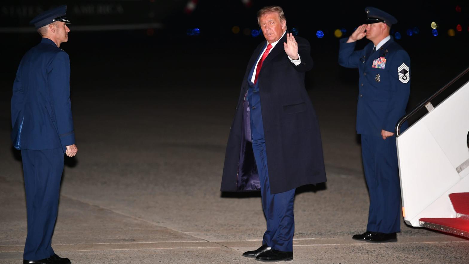 US President Donald Trump waves after stepping off Air Force One upon arrival at Andrews Air Force Base in Maryland on September 30, 2020.  (Photo: Mandel Ngan, Getty Images)