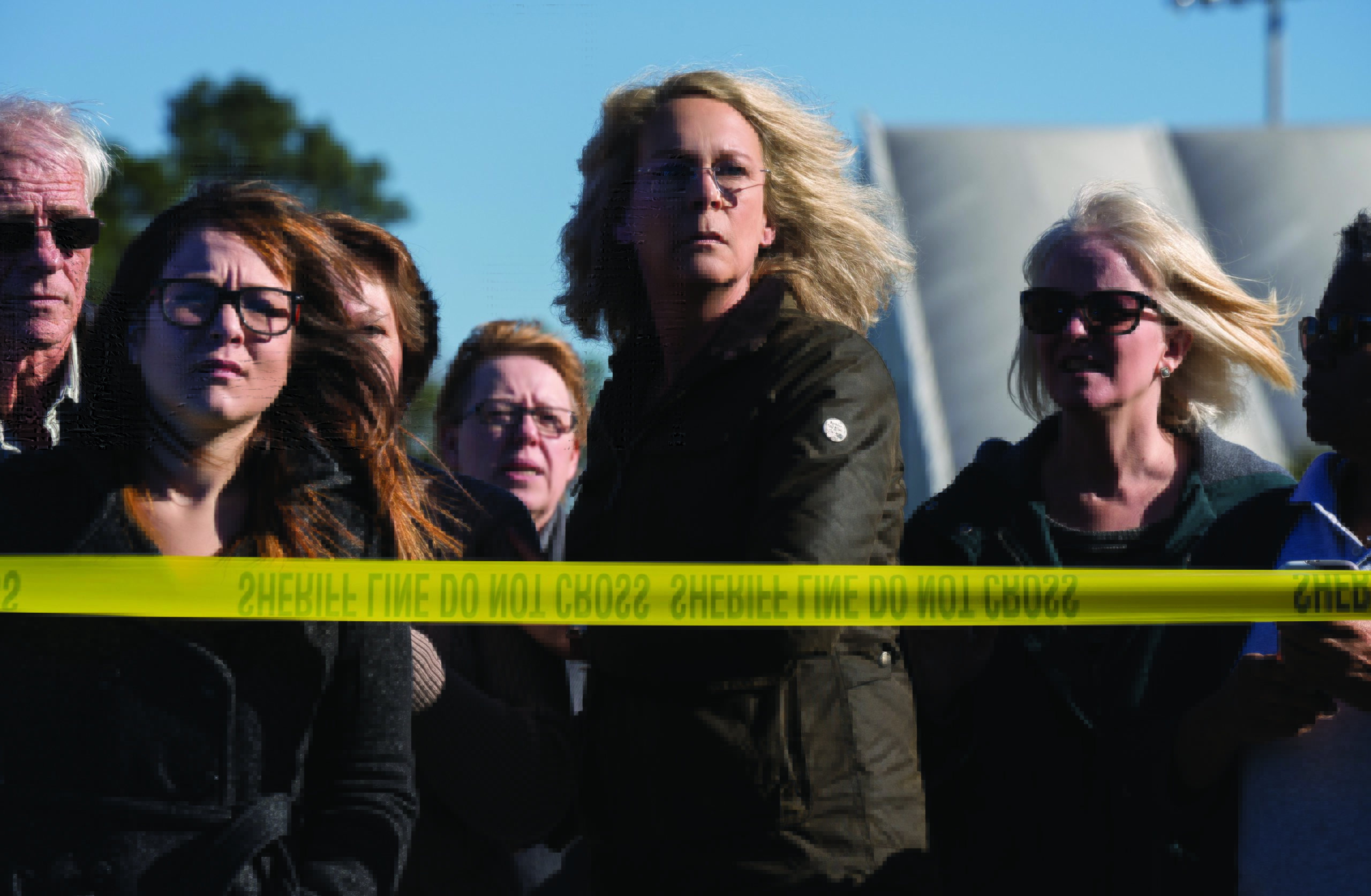 Halloween's Laurie Strode (Jamie Lee Curtis) is used to seeing lots of crime scene tape around her hometown. (Photo: Ryan Green/Universal Pictures)