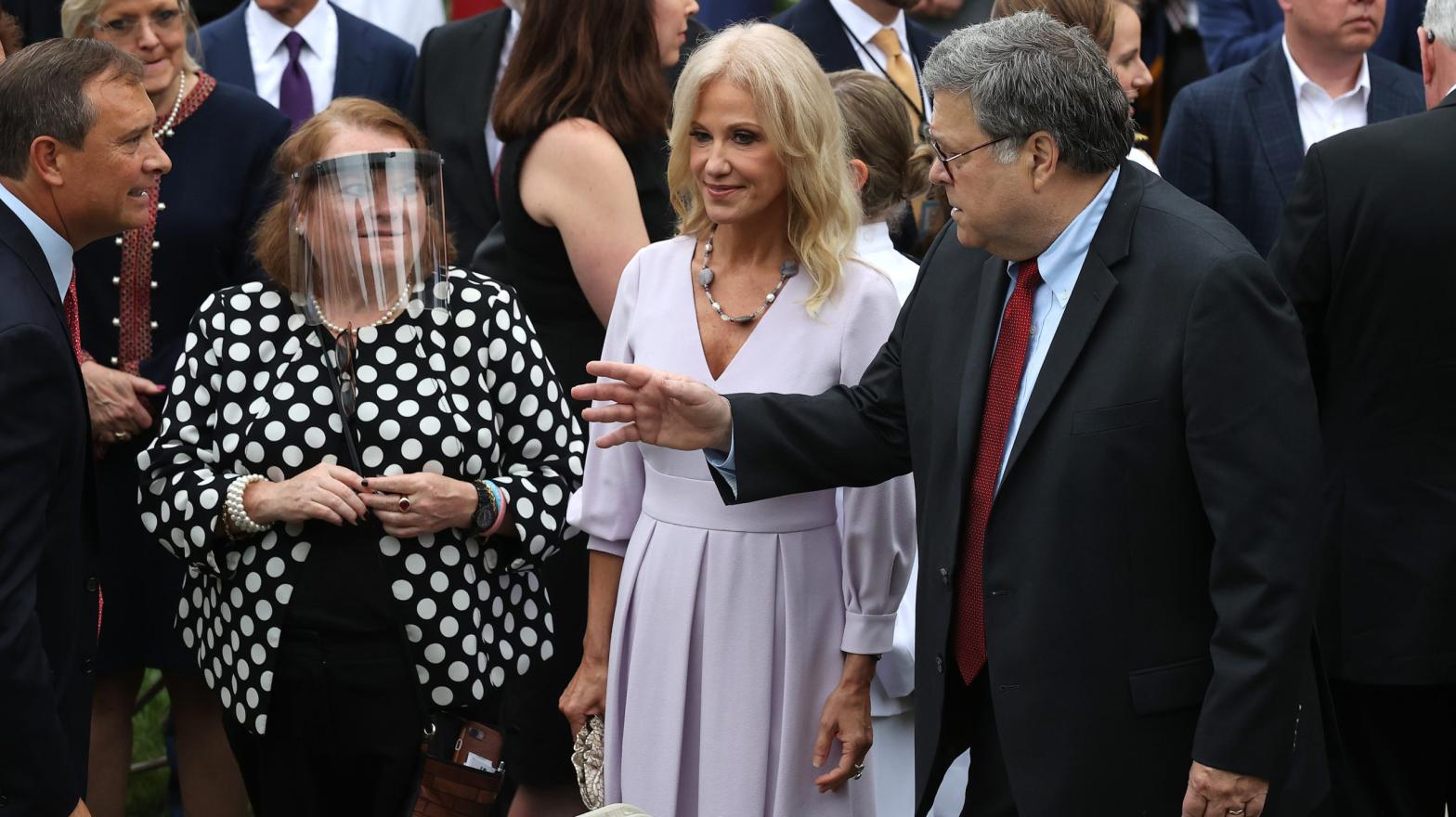 Kellyanne Conway (centre) is seen with Attorney General William Barr (right) and guests at the Rose Garden Supreme Court nomination event on Sept. 26. At least seven people in attendance that day have tested positive for covid-19 since, including President Donald Trump. (Photo:  Chip Somodevilla, Getty Images)