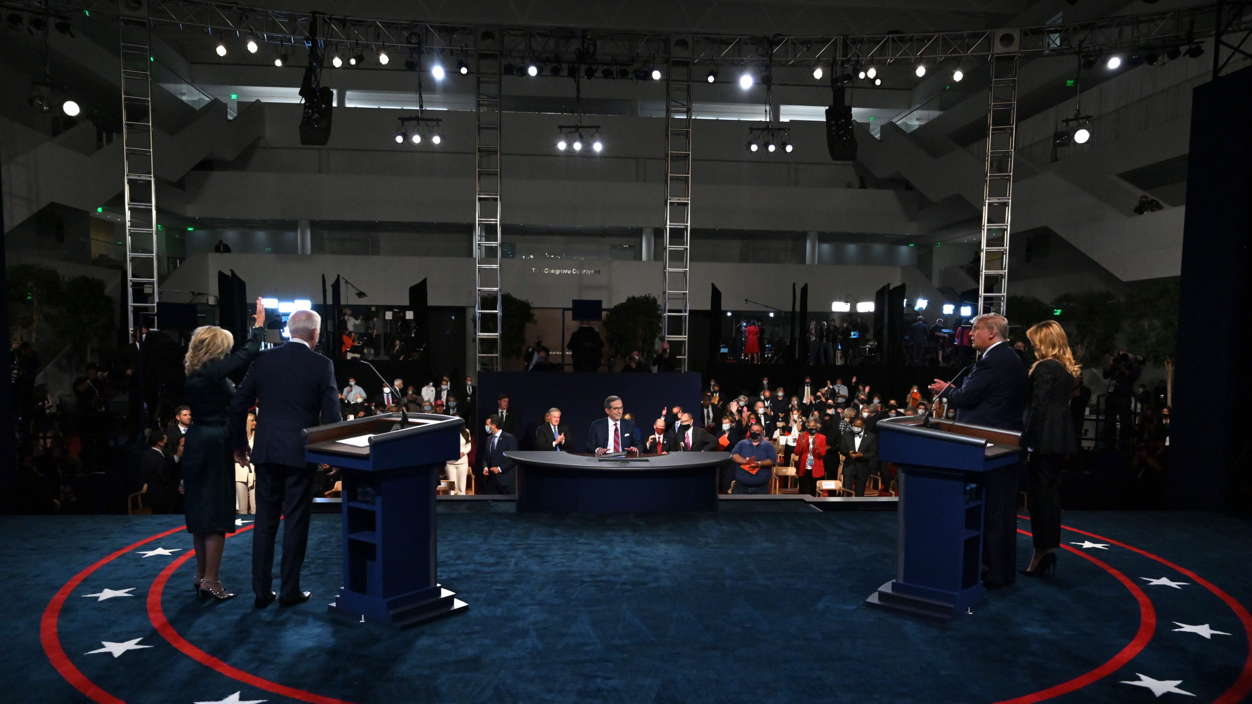 Democratic presidential nominee Joe Biden and his wife Dr. Jill Biden (L) stand on stage with U.S. President Donald Trump and First Lady Melania Trump (R) and moderator Chris Wallace after the first presidential debate (Photo: Olivier Douliery-Pool, Getty Images)