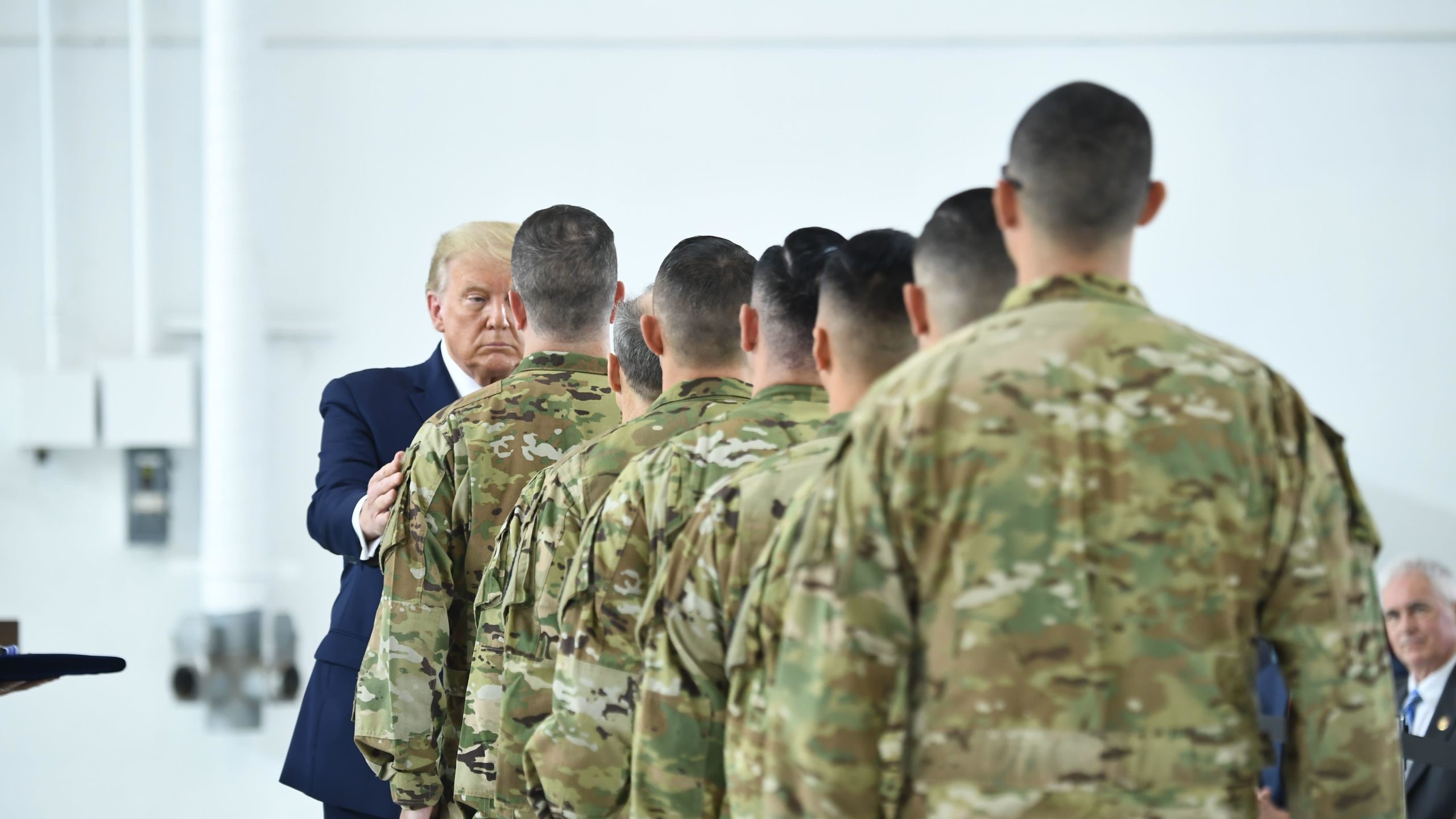 U.S. President Donald Trump awards the Distinguished Flying Cross to pilots and crew members of the California Army National Guard who saved 242 lives from the wildfires on Sept. 5. (Photo: Brendan Smialowski/AFP, Getty Images)