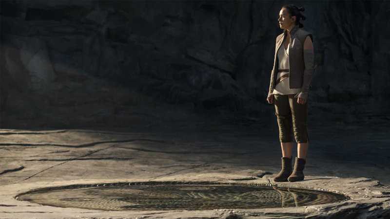 Rey stands on the steps of ancient history. (Image: Lucasfilm)