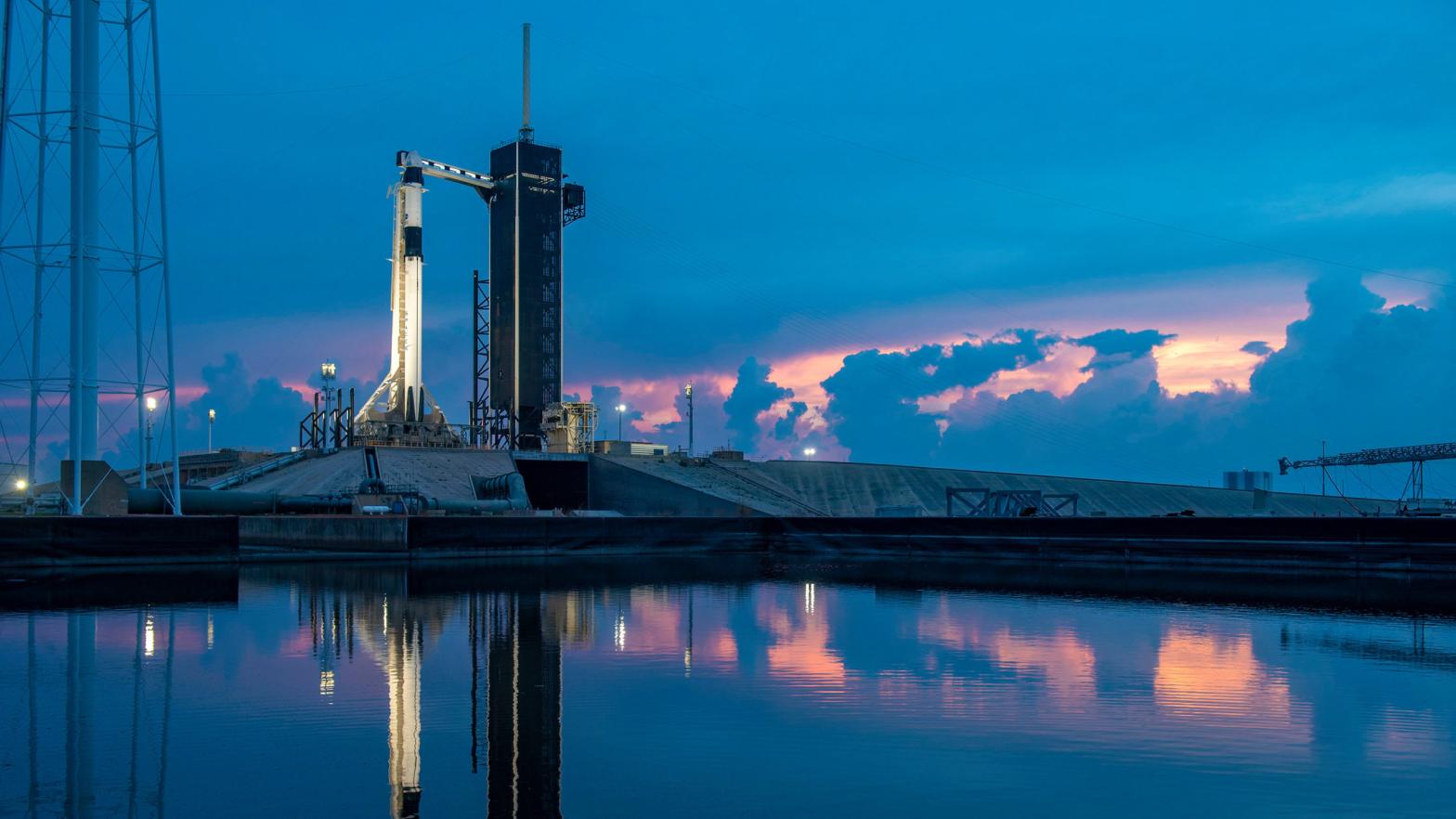 In this handout photo provided by SpaceX, the SpaceX Falcon 9 rocket with the manned Crew Dragon spacecraft sits on launch pad 39A at the Kennedy Space Centre on May 26, 2020 in Cape Canaveral, Florida. (Photo: SpaceX / Handout, Getty Images)