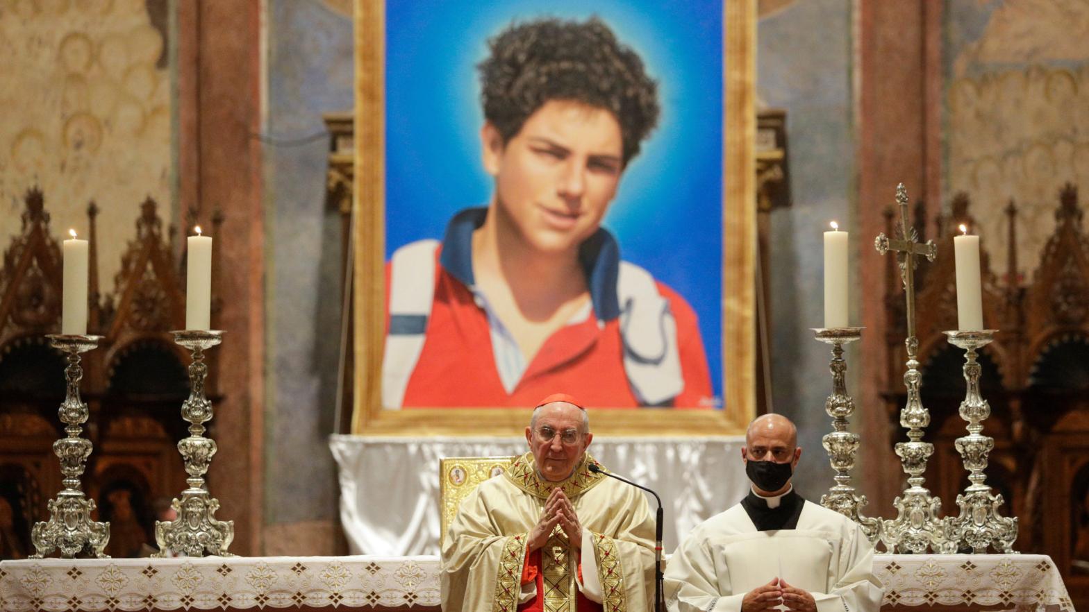 Image of 15-year-old Carlos Acutis is displayed at his beatification ceremony at the St. Francis Basilica on October 10th, 2020.  (Photo: Gregorio Borgia, AP)