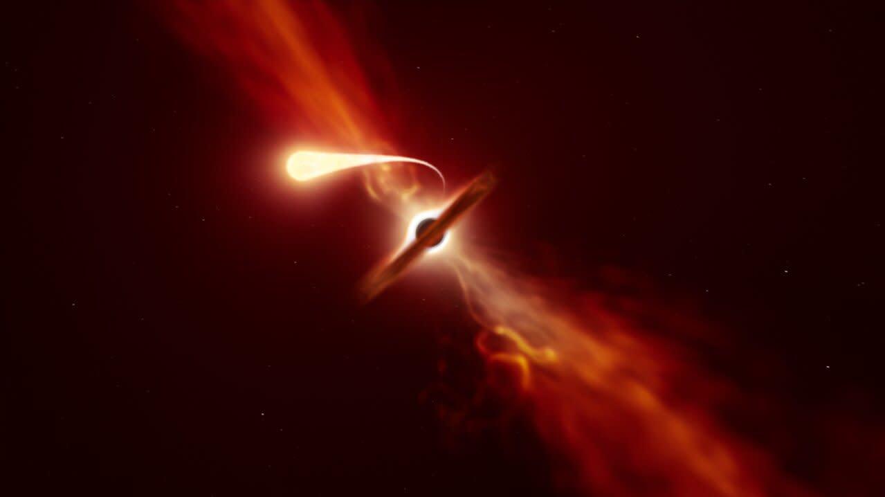 Artist's impression of a star undergoing spaghettification near a supermassive black hole.  (Image: ESO)