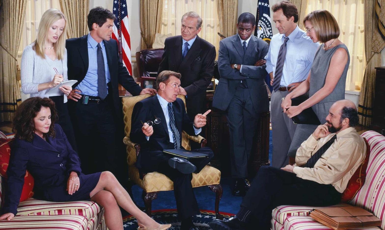 A photograph of the West Wing cast