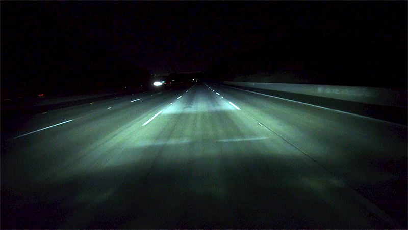 A light carpet illuminates only the driver's lane to spare the eyes of oncoming motorists. (Gif: Audi)
