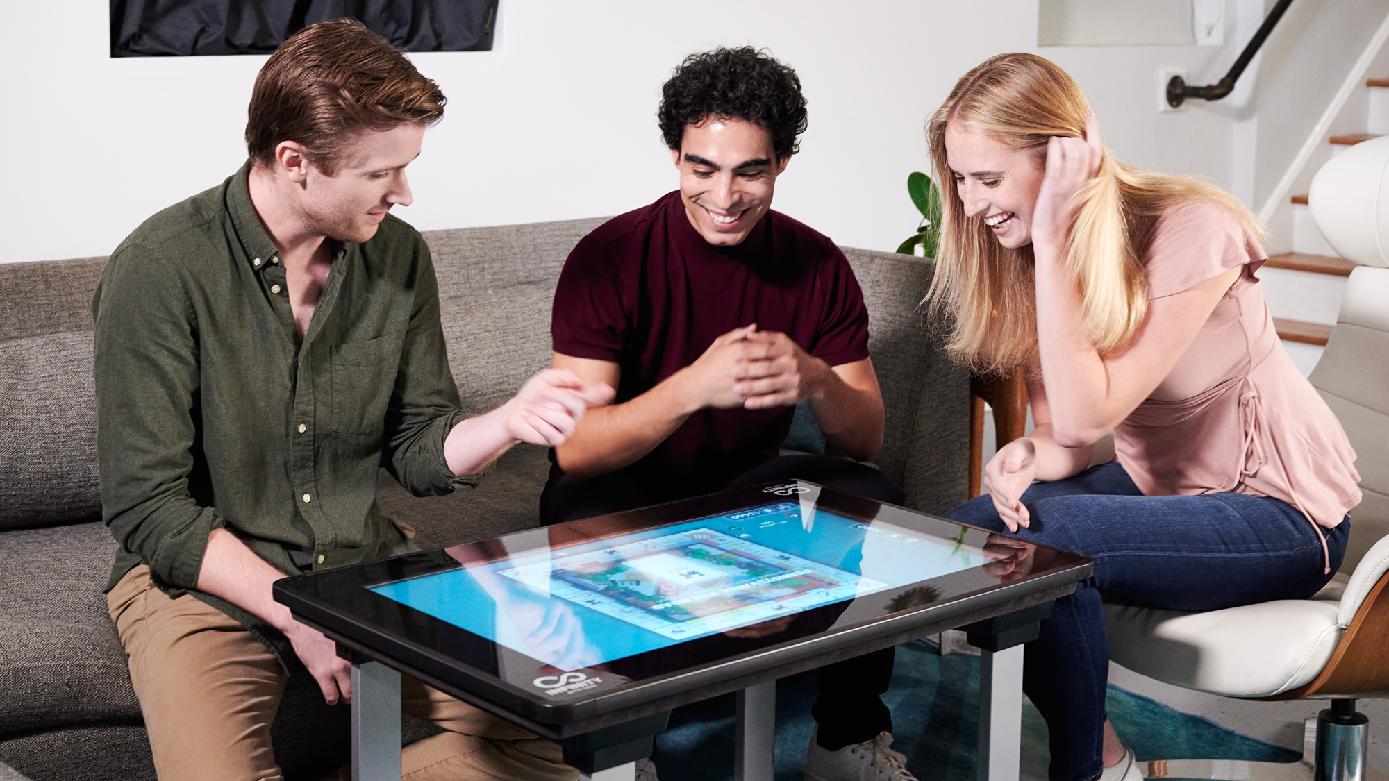 Up to six players can crowd around the Infinity Game Table at once, but online multiplayer means they don't necessarily all have to be under the same roof. (Image: Arcade1Up)