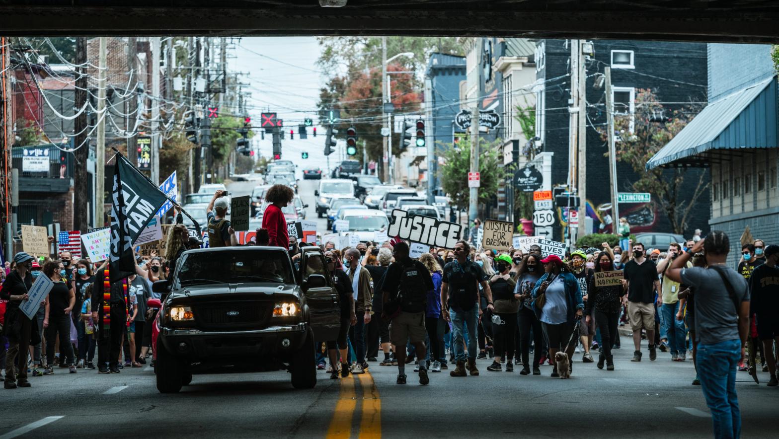 A group of protesters gathers in the street in a march to the Breonna Taylor memorial at Jefferson Square Park on October 10, 2020 in Louisville, Kentucky.  (Photo: Jon Cherry, Getty Images)