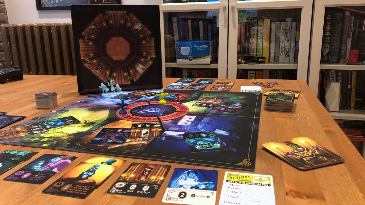 A general glimpse at the board and cards, and a peek at the inside box cover art for fun. (Photo: Beth Elderkin/io9)