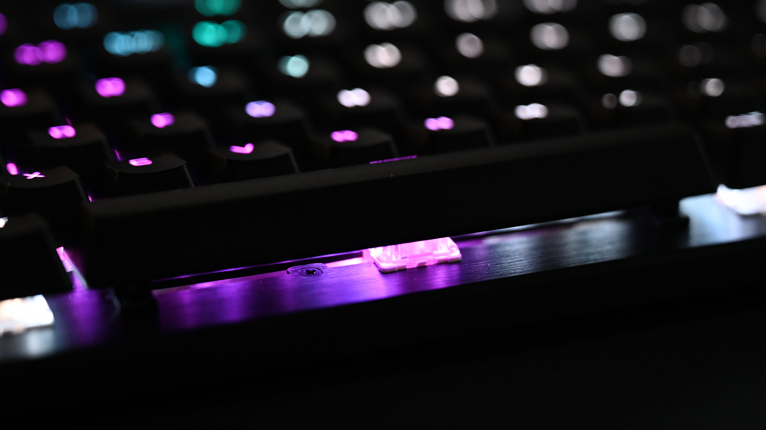 The RGB lighting on the K100 shines real bright.  (Photo: Sam Rutherford/Gizmodo)