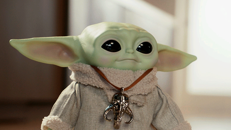 Baby Yoda's head can turn and move up and down, but those wiggling ears steal the show. (Gif: Mattel)