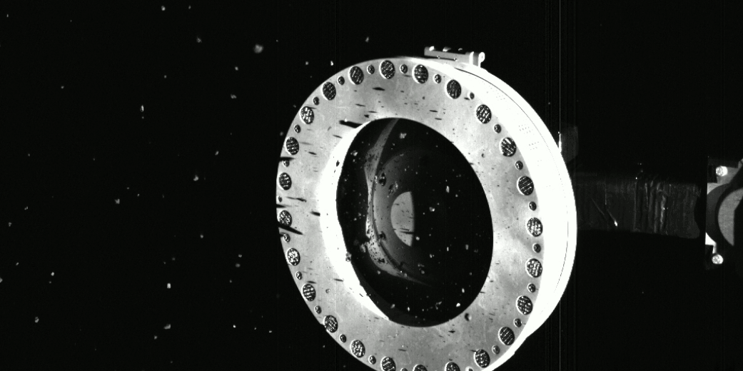 Taken on October 22, this series of three images shows debris leaking out from the sampler head.  (Gif: NASA)