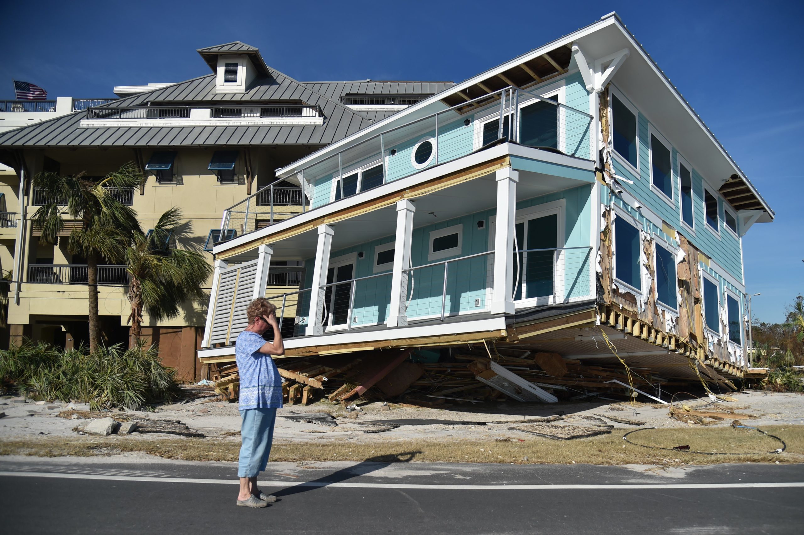 Claire mourns as she sees the damage caused by Hurricane Michael in Mexico Beach, Florida on Oct. 12, 2018. (Photo: Hector Retamal/AFP, Getty Images)