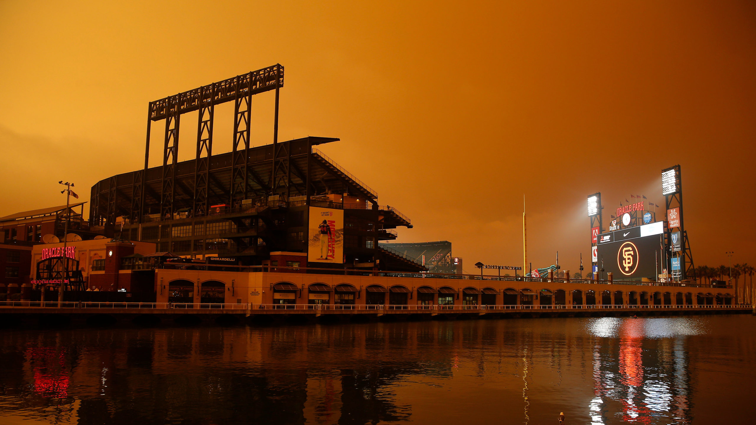 Include anAn exterior view of the ballpark before the game between the San Francisco Giants and the Seattle Mariners at Oracle Park on Sept. 9, 2020 in San Francisco, California. Smoke from various wildfires burning across Northern California has blanketed the city in an orange glow. (Photo: Lachlan Cunningham, Getty Images)