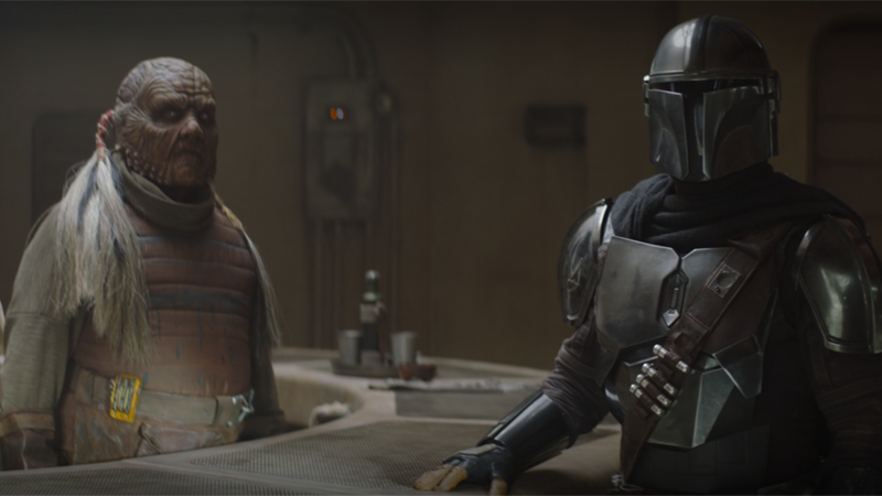 Brown tending bar in a slightly different riff of the wild, wild west in last week's The Mandalorian. (Screenshot: Lucasfilm)