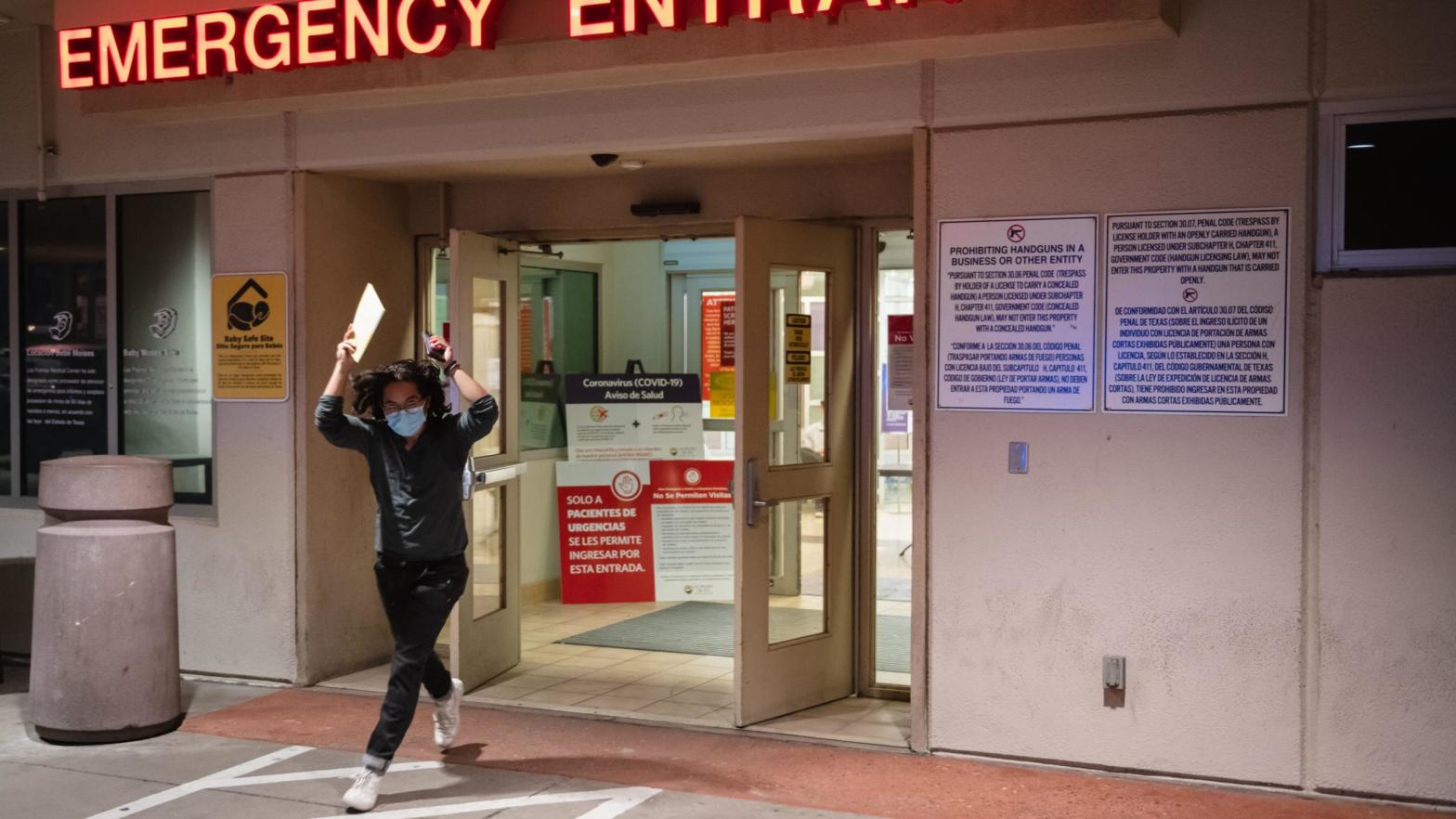 Man leaves the Las Palmas Medical Centre in El Paso, Texas on November 3, 2020 to deliver an emergency ballot cast by a person hospitalized with covid-19. (Photo: Justin Hamel, Getty Images)