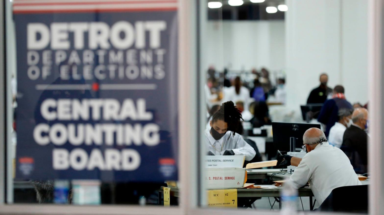 Election workers count absentee ballots for the 2020 general election at TCF Centre on November 4, 2020 in Detroit, Michigan. (Photo: Jeff Kowalsky, Getty Images)