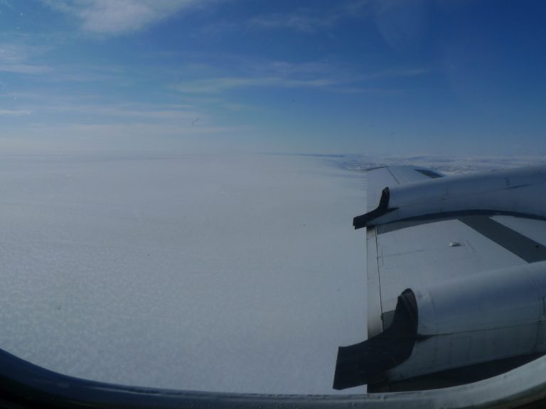 NASA's Operation IceBridge at work, flying over a vast Greenland ice sheet.  (Image: Kirsty Tinto/Lamont-Doherty Earth Observatory)