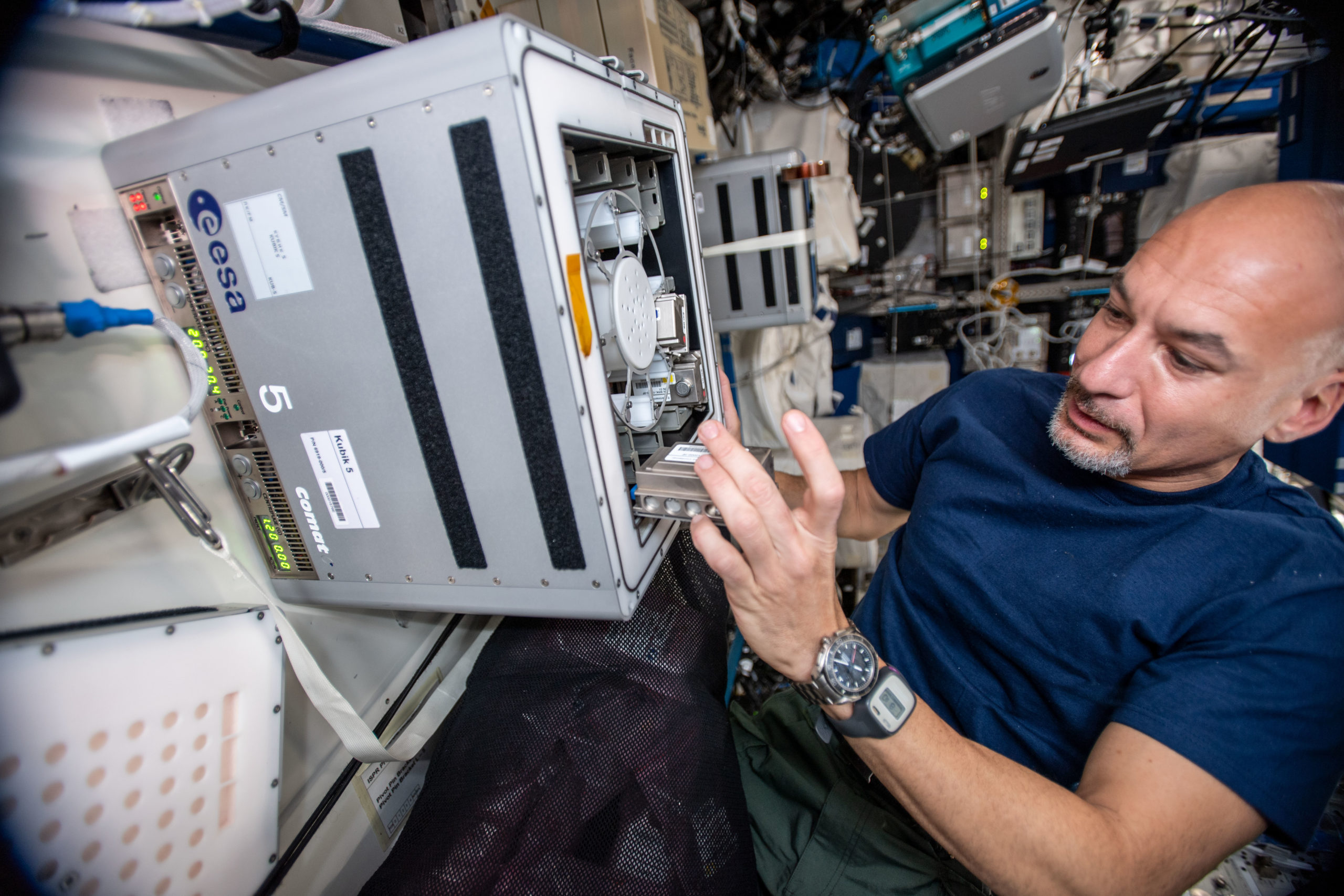 ESA astronaut Luca Parmitano installing the BioRock experiment on the ISS.  (Image: ESA)