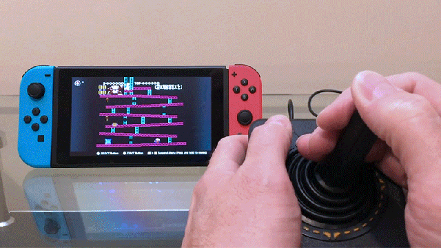 Playing the Nintendo Switch With an Original 1977 Atari Joystick Is Extreme Devotion to Retro Gaming