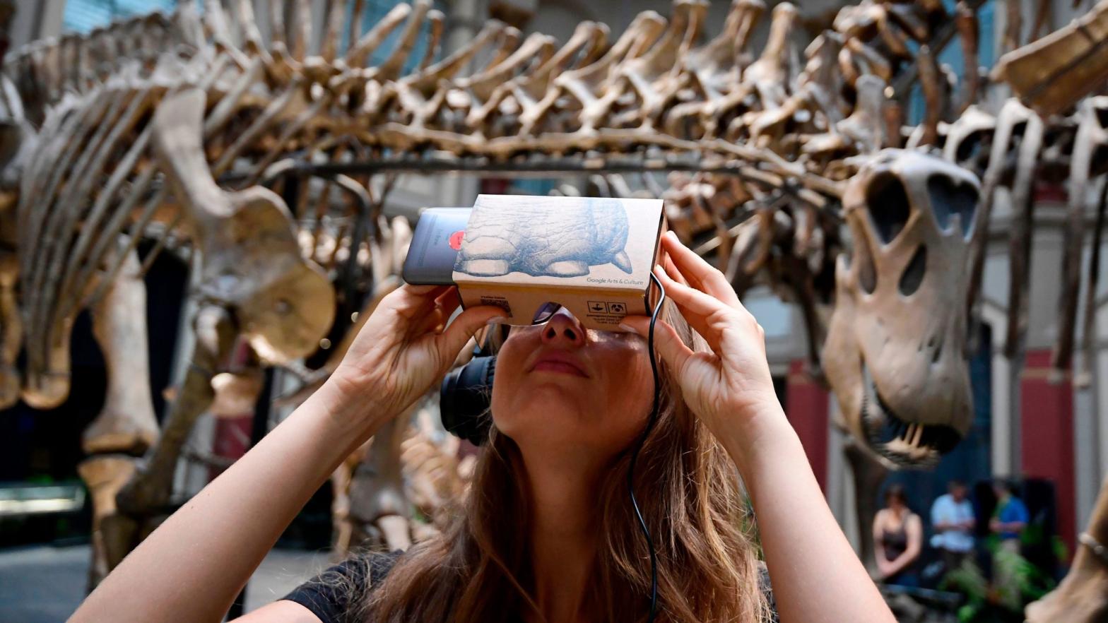 Google is migrating many of the functions of its virtual reality field trips app Expeditions to its Arts & Culture app, which the woman pictured above is using to interact with exhibits at the Museum of Natural History in Berlin.  (Photo: Tobias Schwarz, Getty Images)