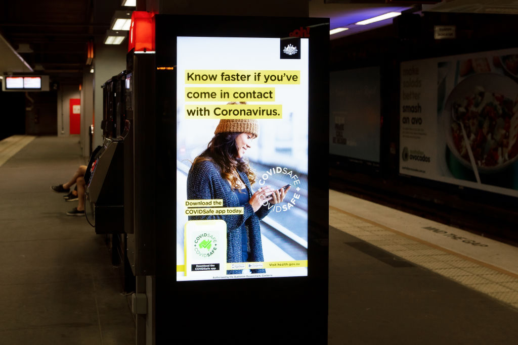 SYDNEY, AUSTRALIA - MAY 18: An Australian Government CovidSafe App advertisement in North Sydney Station. New public transport restrictions in Sydney will see commuter traffic cut by 1.4 million, with a maximum of of 32 people in a train carriage at any given time due to the Coronavirus (COVID-19) pandemic on 18 May, 2020 in Sydney, Australia. (Photo by Speed Media/Icon Sportswire)