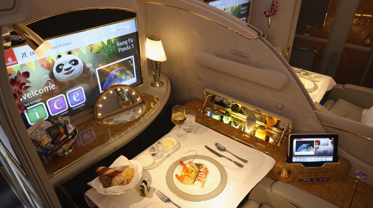 A meal lies served in a compartment in first class on board an Emirates A380 passenger plane. (Photo: Sean Gallup, Getty Images)