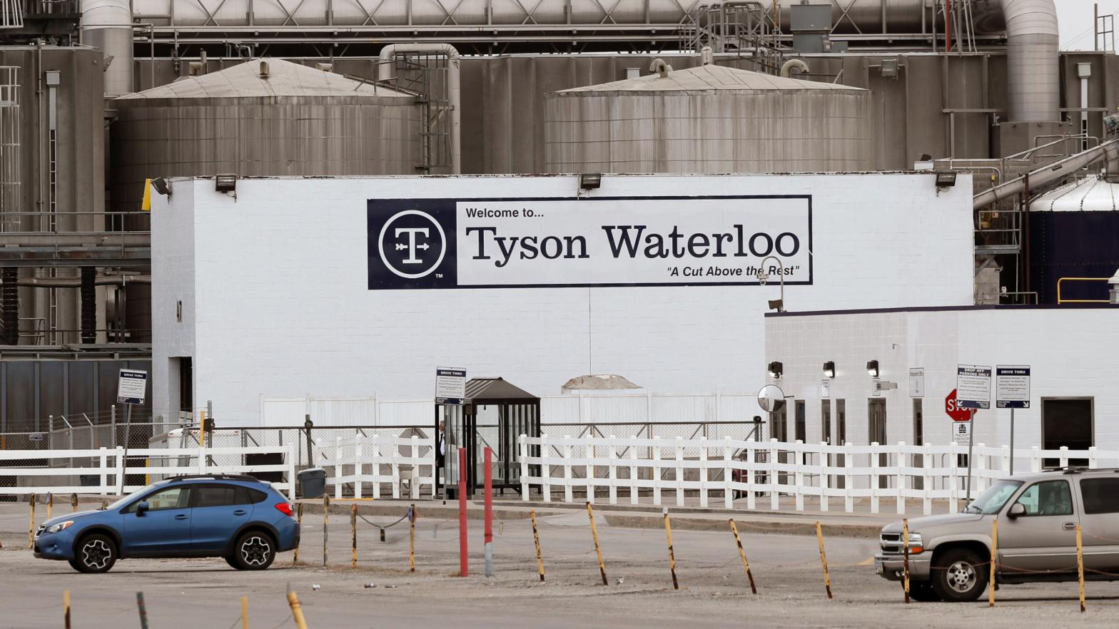 In this May 1, 2020, file photo, vehicles sit in a near empty parking lot outside the Tyson Foods plant in Waterloo, Iowa. (Photo: Charlie Neibergall, AP)