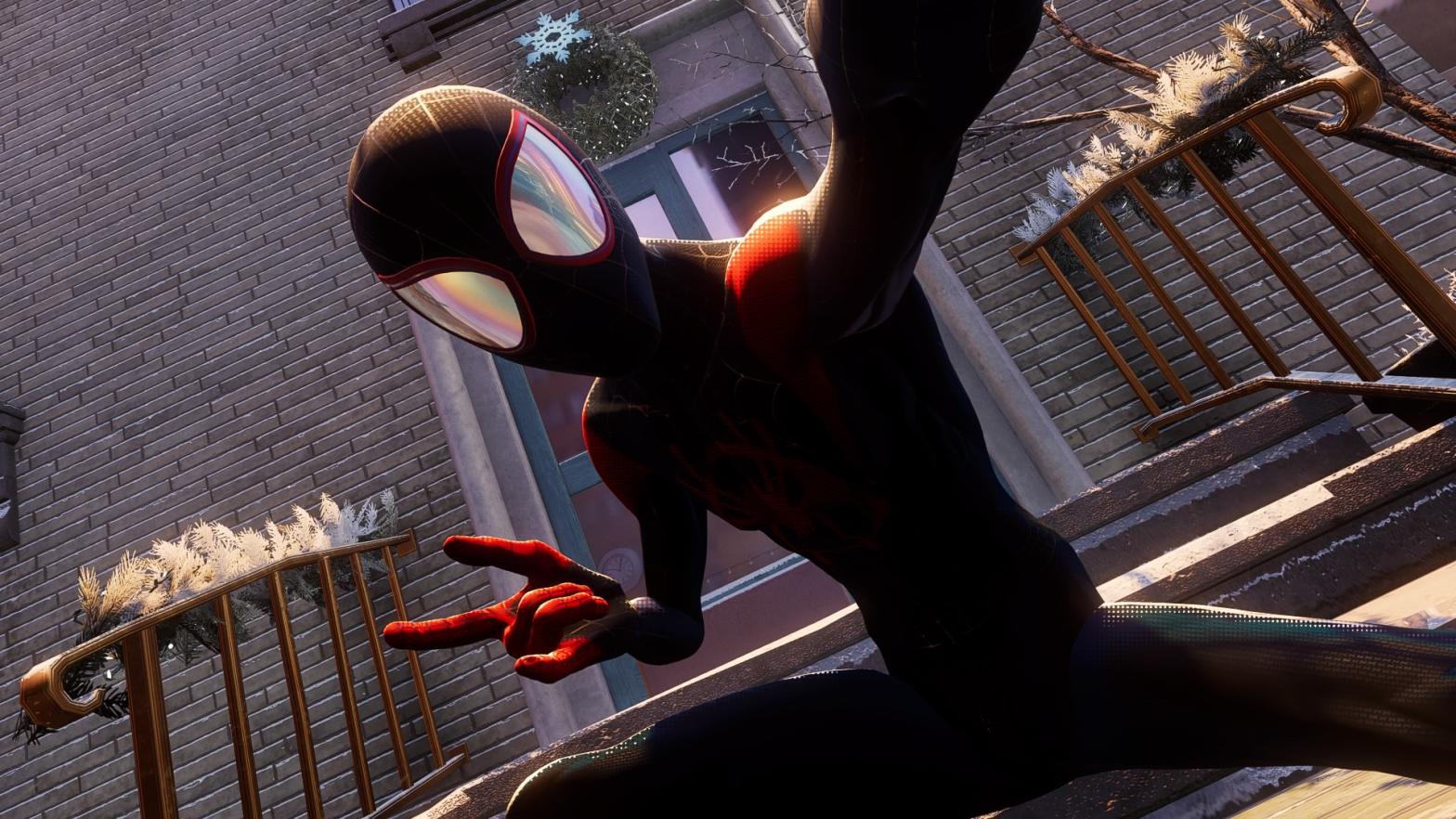 Spider-Man snapping a selfie somewhere in Harlem. (Screenshot: Sony/Insomniac)