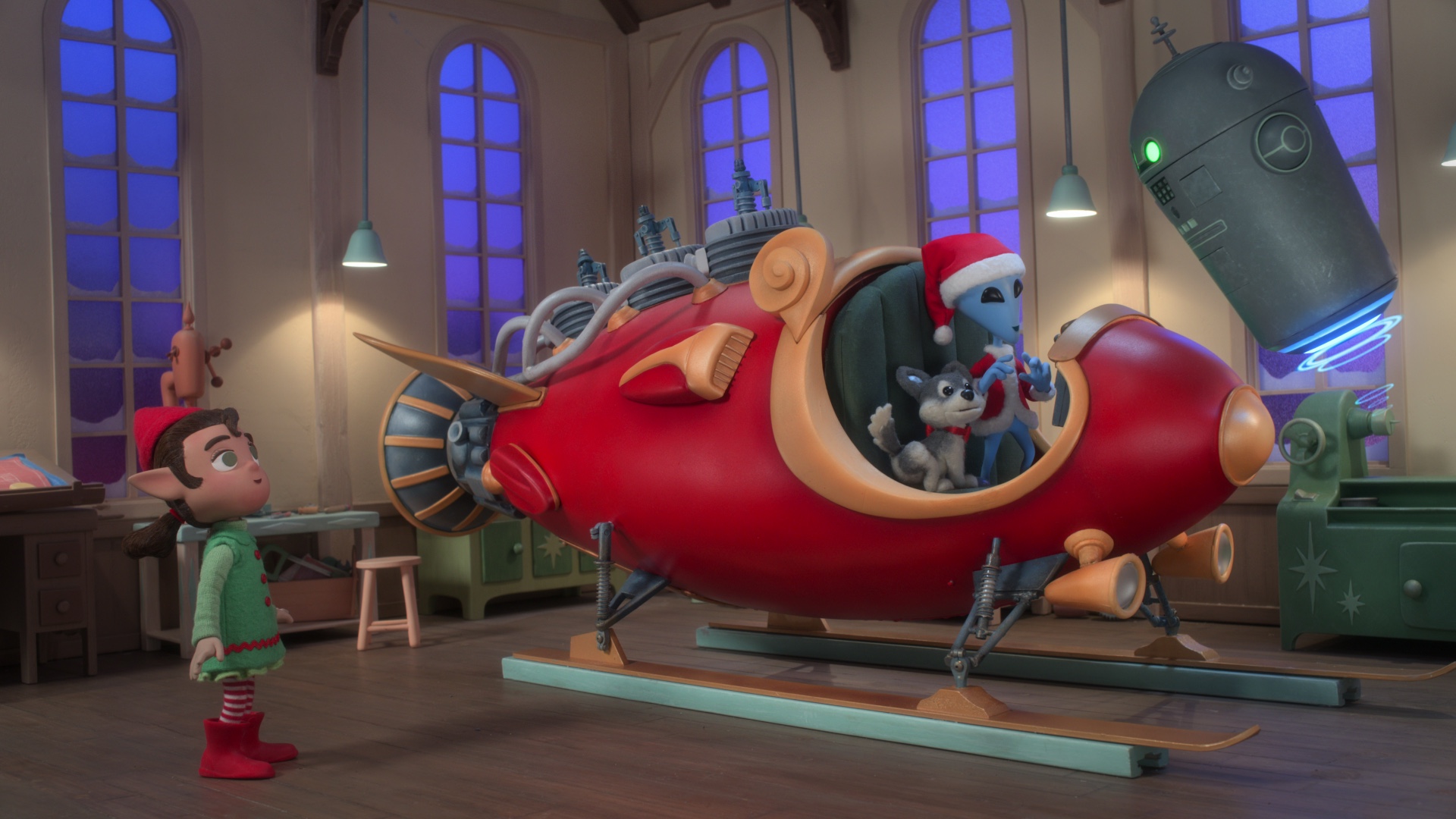 Holly, the puppy, X, and SAMTU test out the sleigh. (Image: Netflix)