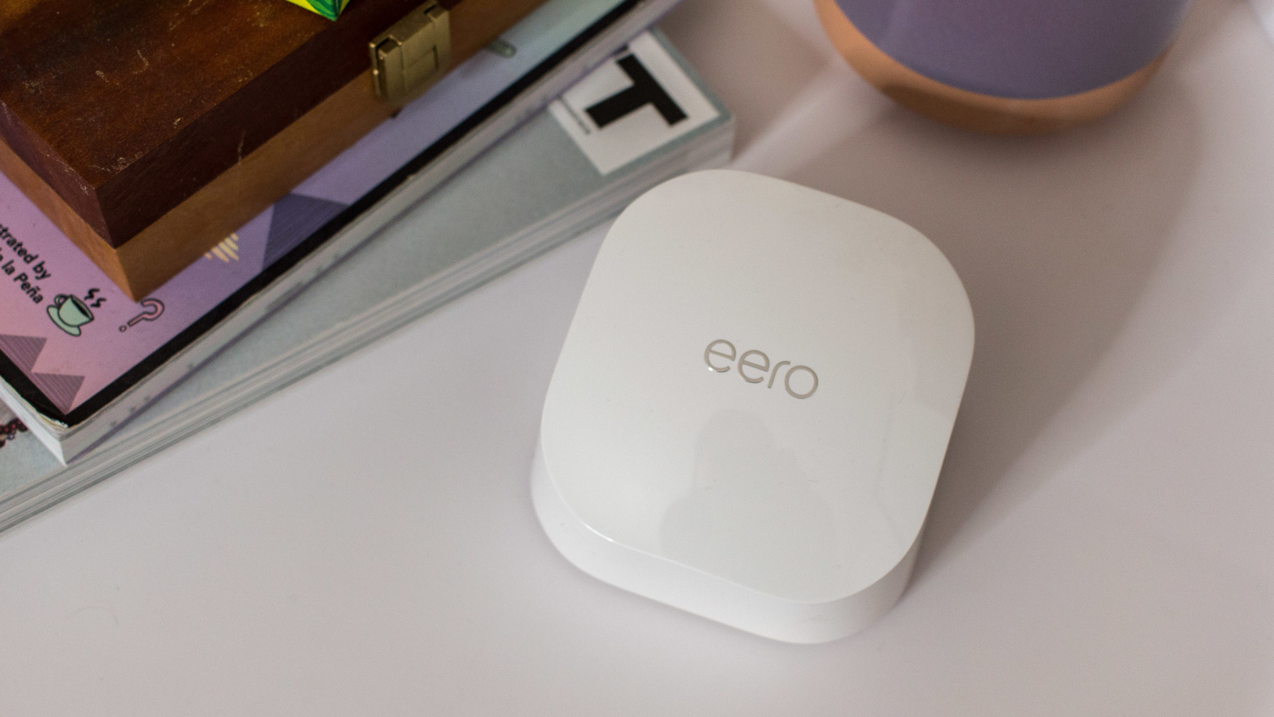 The Eero 6 router is the only unit with an extra Ethernet jack for hardwiring. The extenders do not have Ethernet jacks. (Photo: Florence Ion/Gizmodo)