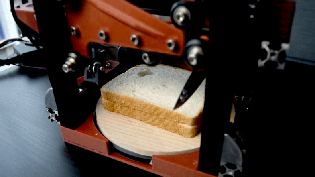 Resourceful Hacker Invents an Automatic Crust-Cutting Robot So They Never Have to Grow Up