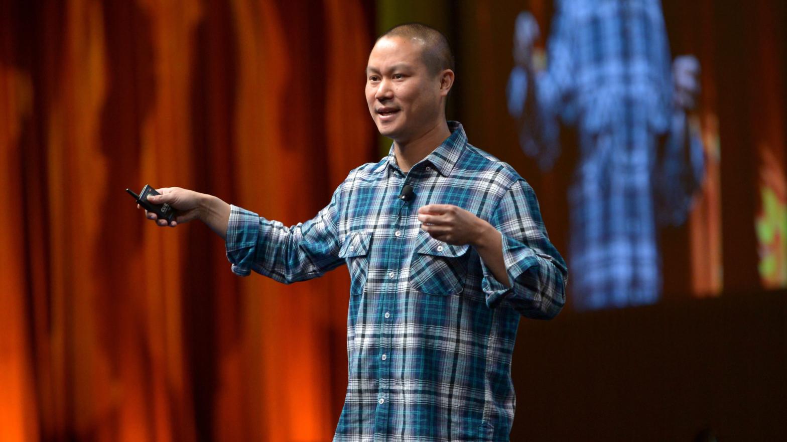 Former Zappos CEO Tony Hsieh, seen here at the 2014 CinemaCon in Las Vegas, Nevada, died at the age of 46 on Friday after sustaining injuries from a house fire. He had retired earlier this year following a 20-year tenure at the online shoe and clothing retailer.  (Photo: Charley Gallay, Getty Images)
