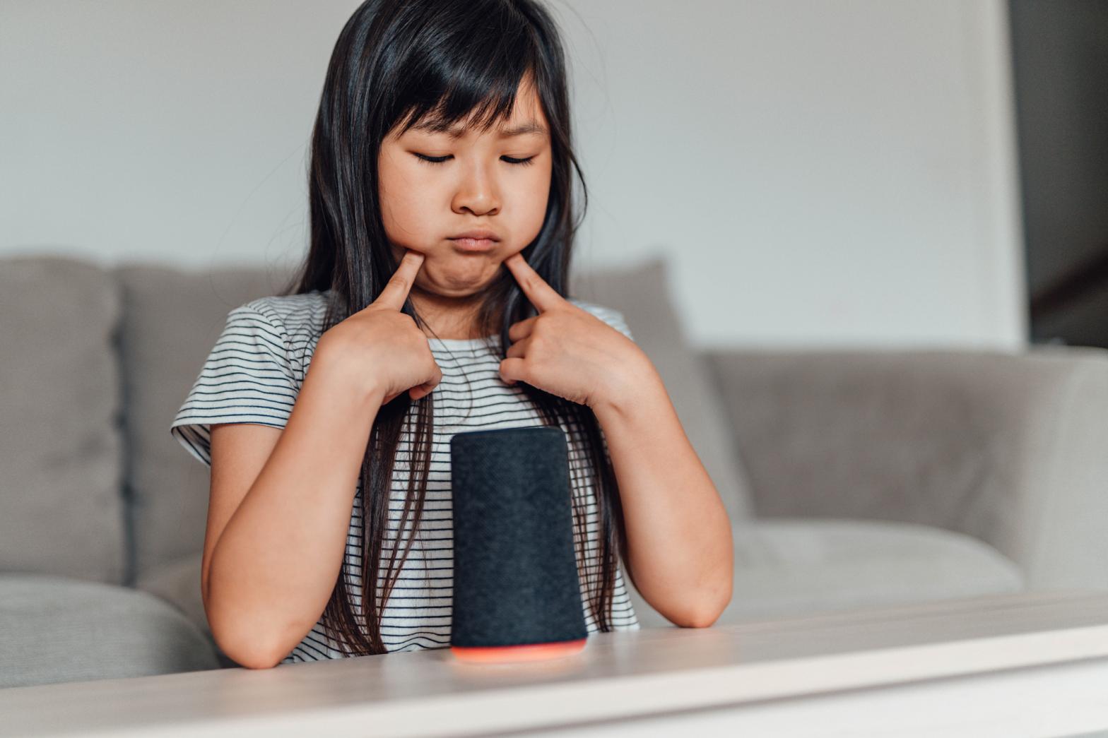 A child plays with a smart toy gift that could spy on her