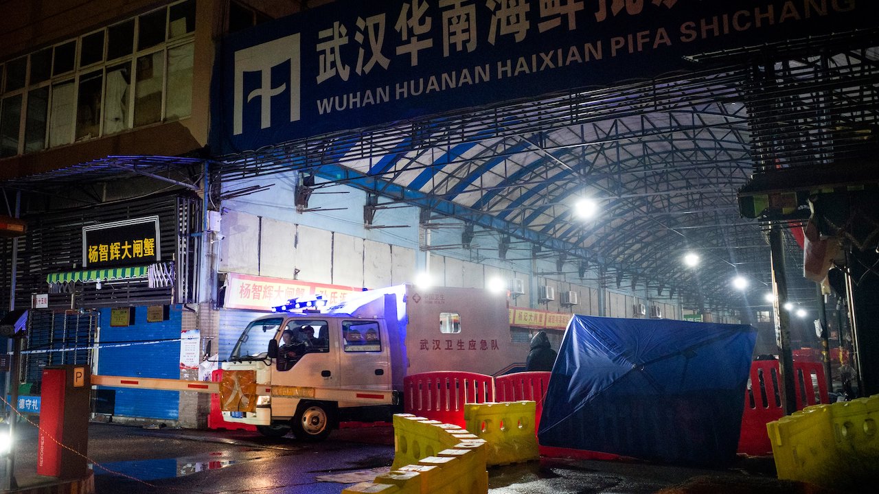 The Wuhan Hygiene Emergency Response Team drives a vehicle as they leave the Huanan Seafood Wholesale Market in the city of Wuhan, in Hubei Province on January 11, 2020. (Photo: Getty, Getty Images)