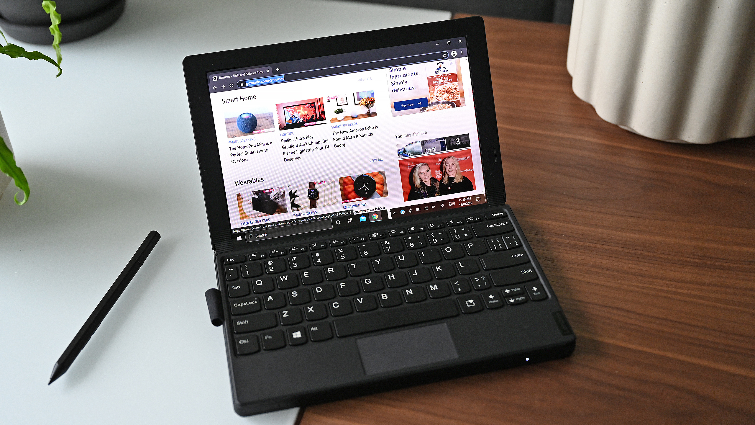 You can also use the X1 Fold as a traditional laptop, either with its magnetic BT covering the bottom half of its flexible display or as one big folding screen.  (Photo: Sam Rutherford/Gizmodo)