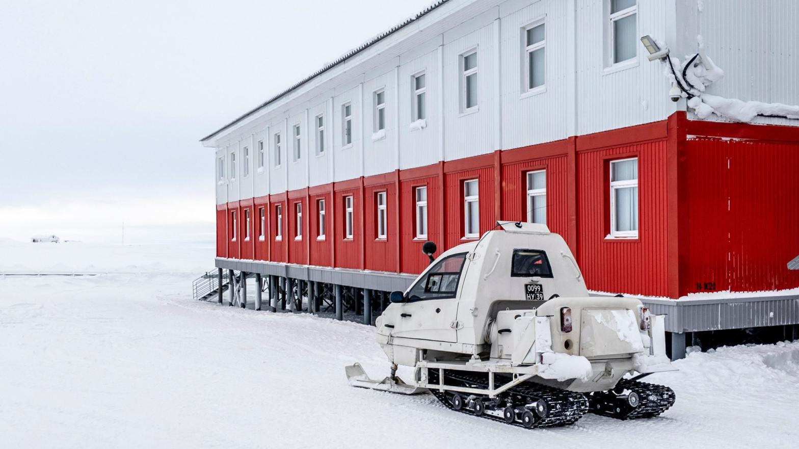 A snowmobile is parked next to a building at the Russian northern military base on Kotelny island. (Photo: Maxime Popov / AFP, Getty Images)