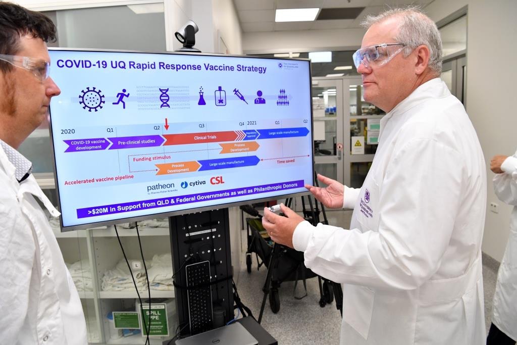 Prime Minister Scott Morrison at the University of Queensland laboratory earlier this year, ahead of today’s announcement its vaccine would not move to the next stage of clinical trials