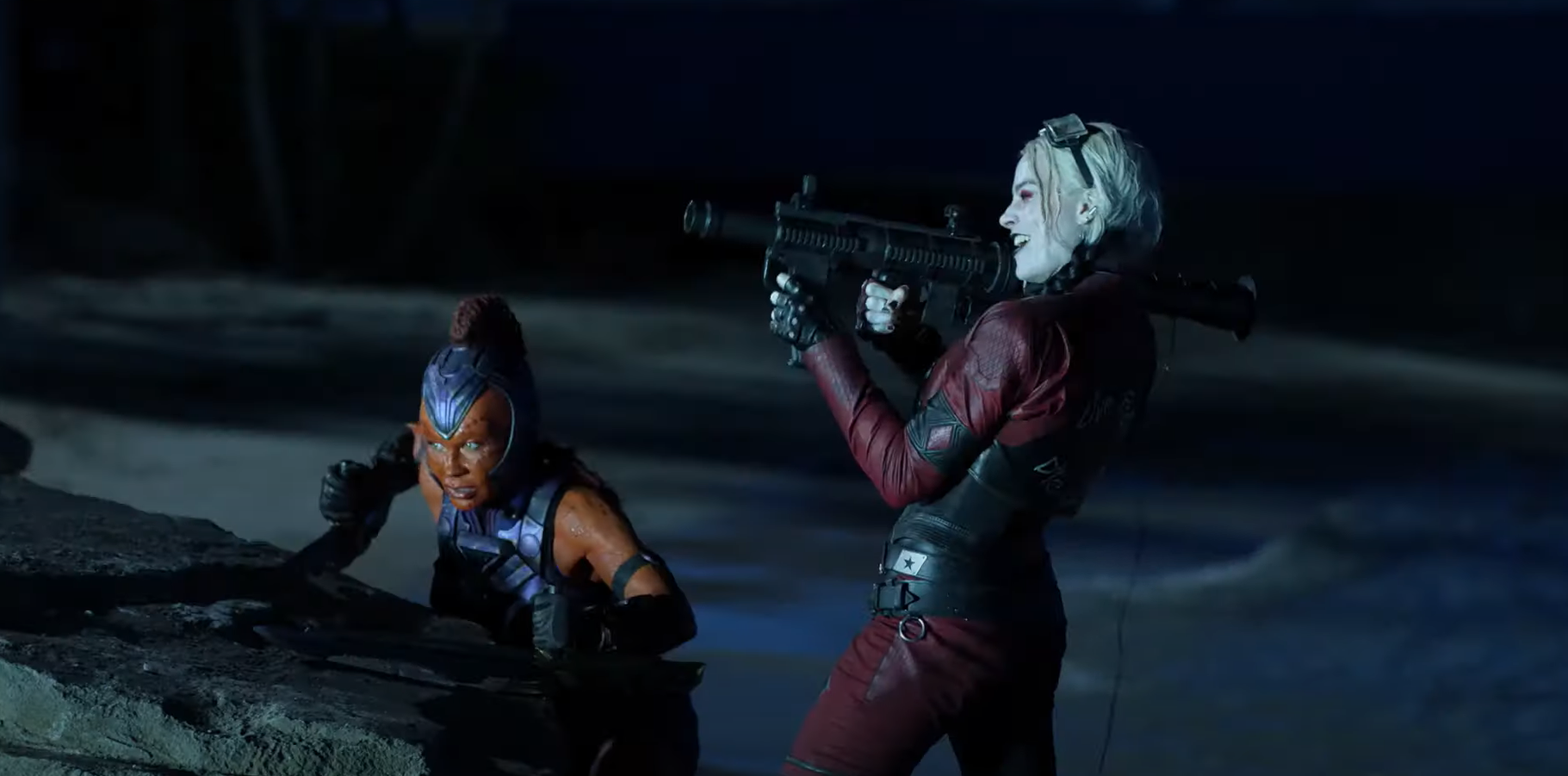 The Suicide Squad's Harley Quinn (Margot Robbie) takes aim. (Screenshot: Warner Bros.)