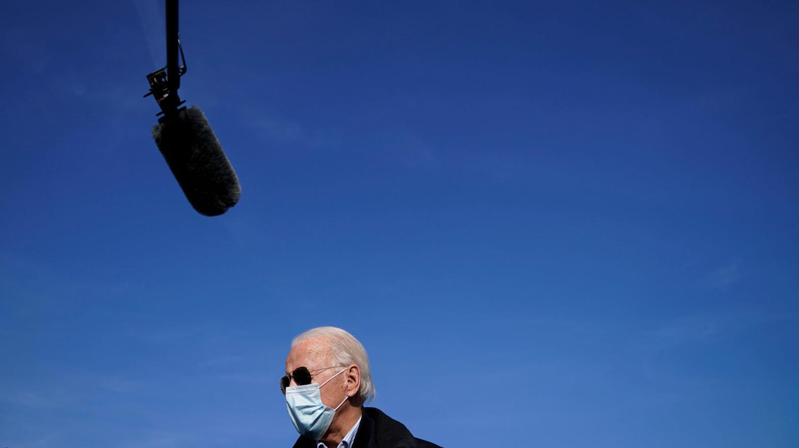 President-elect Joe Biden speaks to reporters before boarding his plane at New Castle Airport on Dec. 15, 2020. (Photo: Drew Angerer, Getty Images)