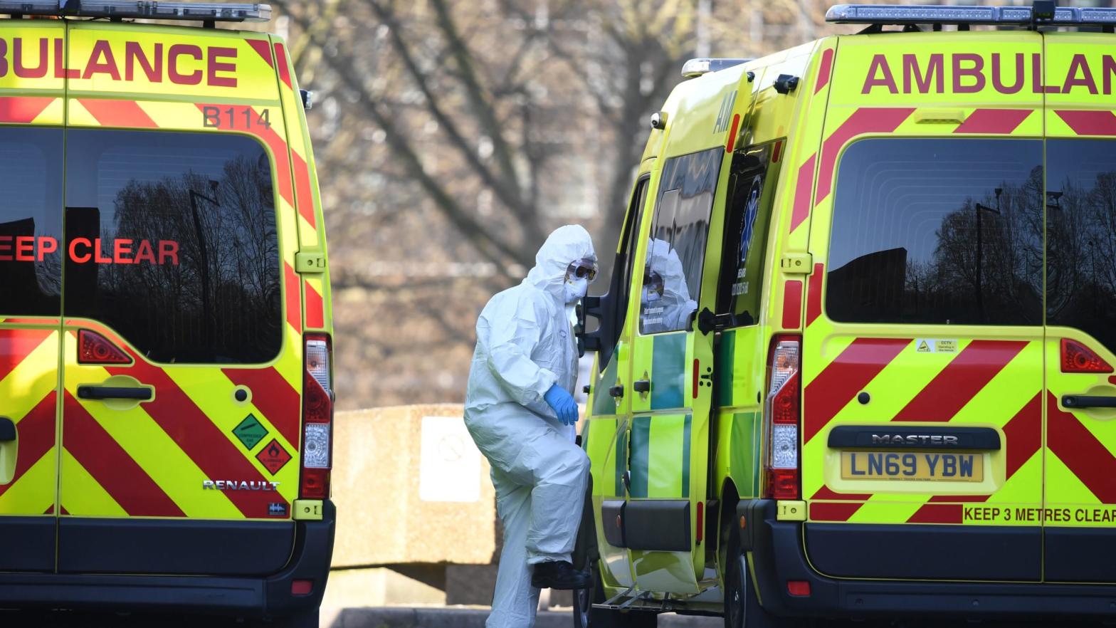 A health care worker getting into an ambulance at St Thomas' Hospital in London on March 24, 2020. (Photo: Daniel Leal-Olivas/AFP, Getty Images)