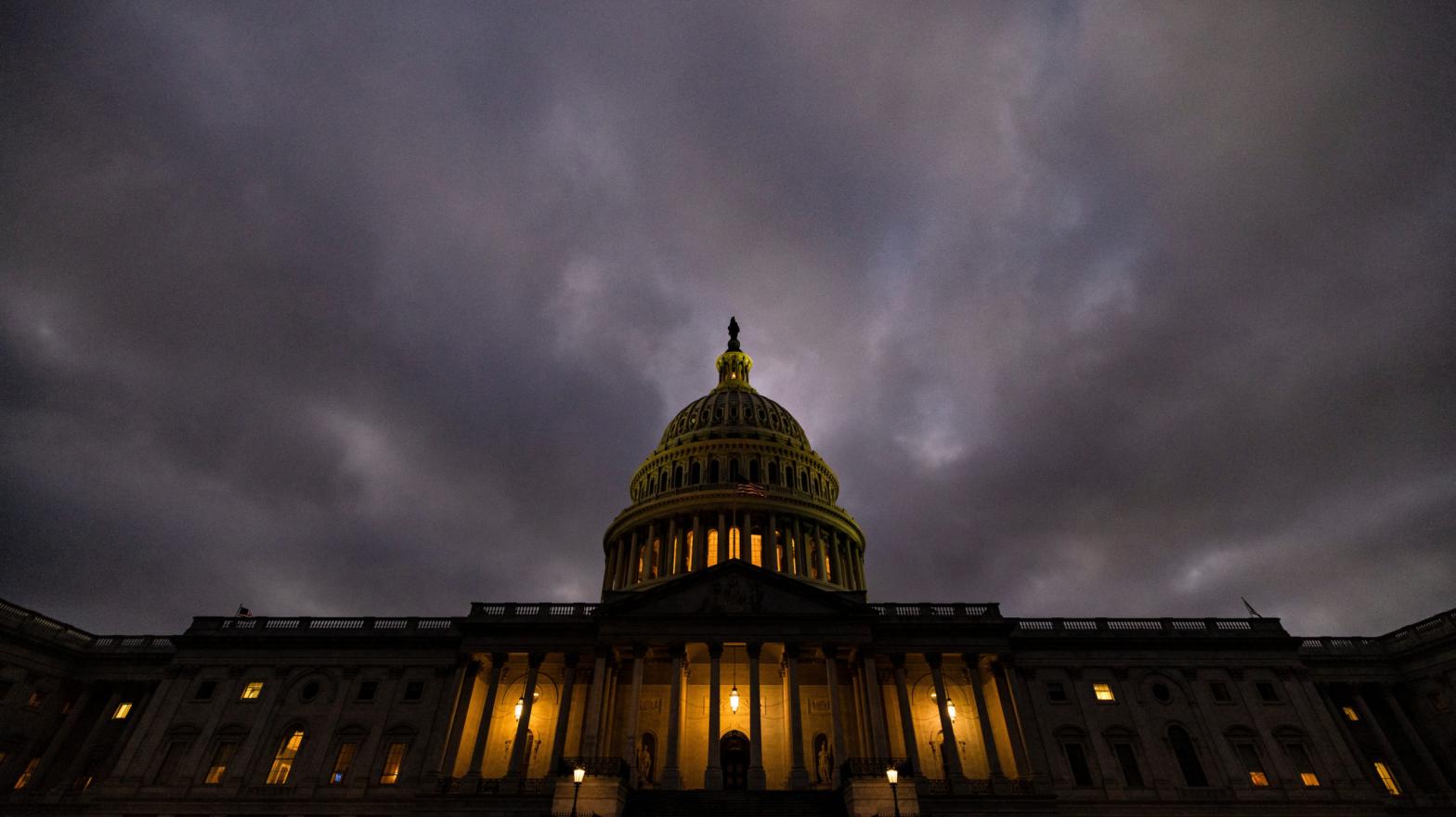 Dusk falls over the US Capitol building on Dec. 20 in Washington, DC. (Photo: Samuel Corum, Getty Images)