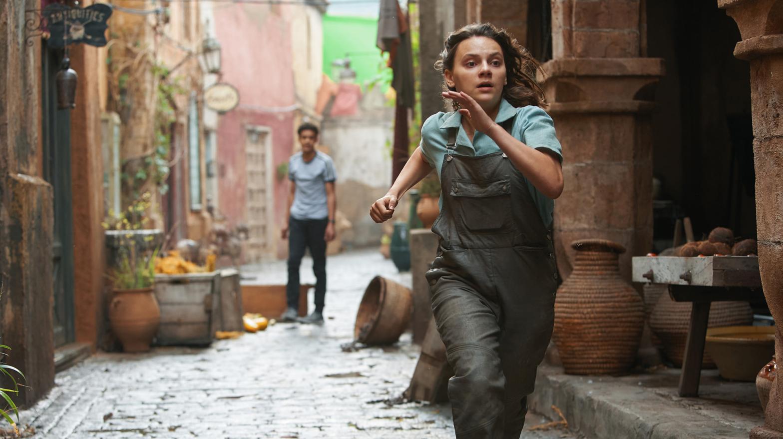 Lyra (Dafne Keen) runs toward danger, per usual.  (Image: HBO)