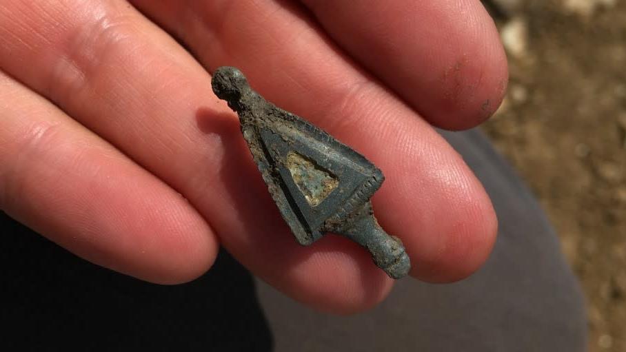 One of the 100-odd brooches found at the site. (Photo: Oxford Archaeology East)