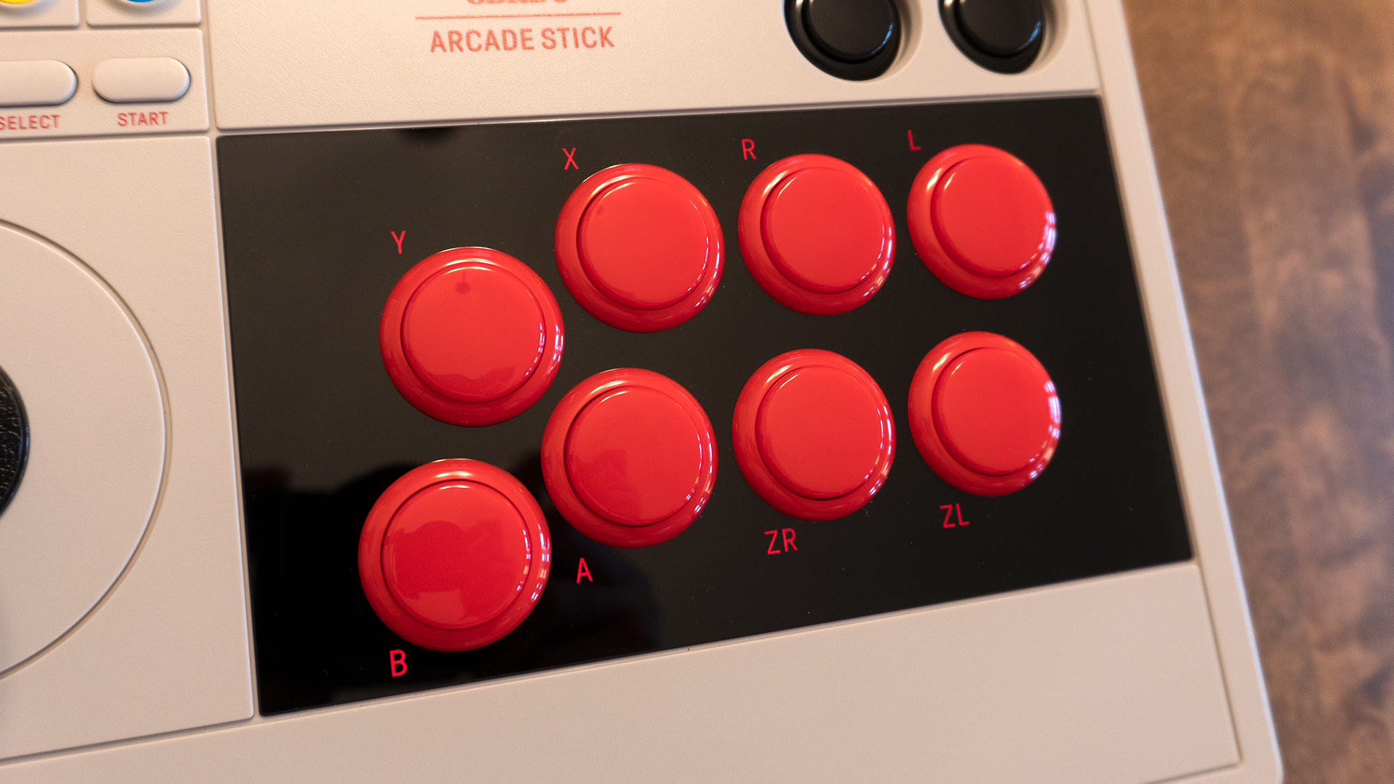 The Arcade Stick's joystick and buttons can all be easily replaced by removing the controller's back panel if you prefer the feel of arcade hardware from another manufacturer. (Photo: Andrew Liszewski / Gizmodo)
