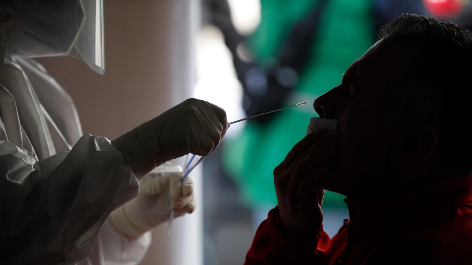A patient in Mexico City, Mexico receiving a covid-19 nasal swab test in December 2020. (Photo: Rebecca Blackwell, AP)