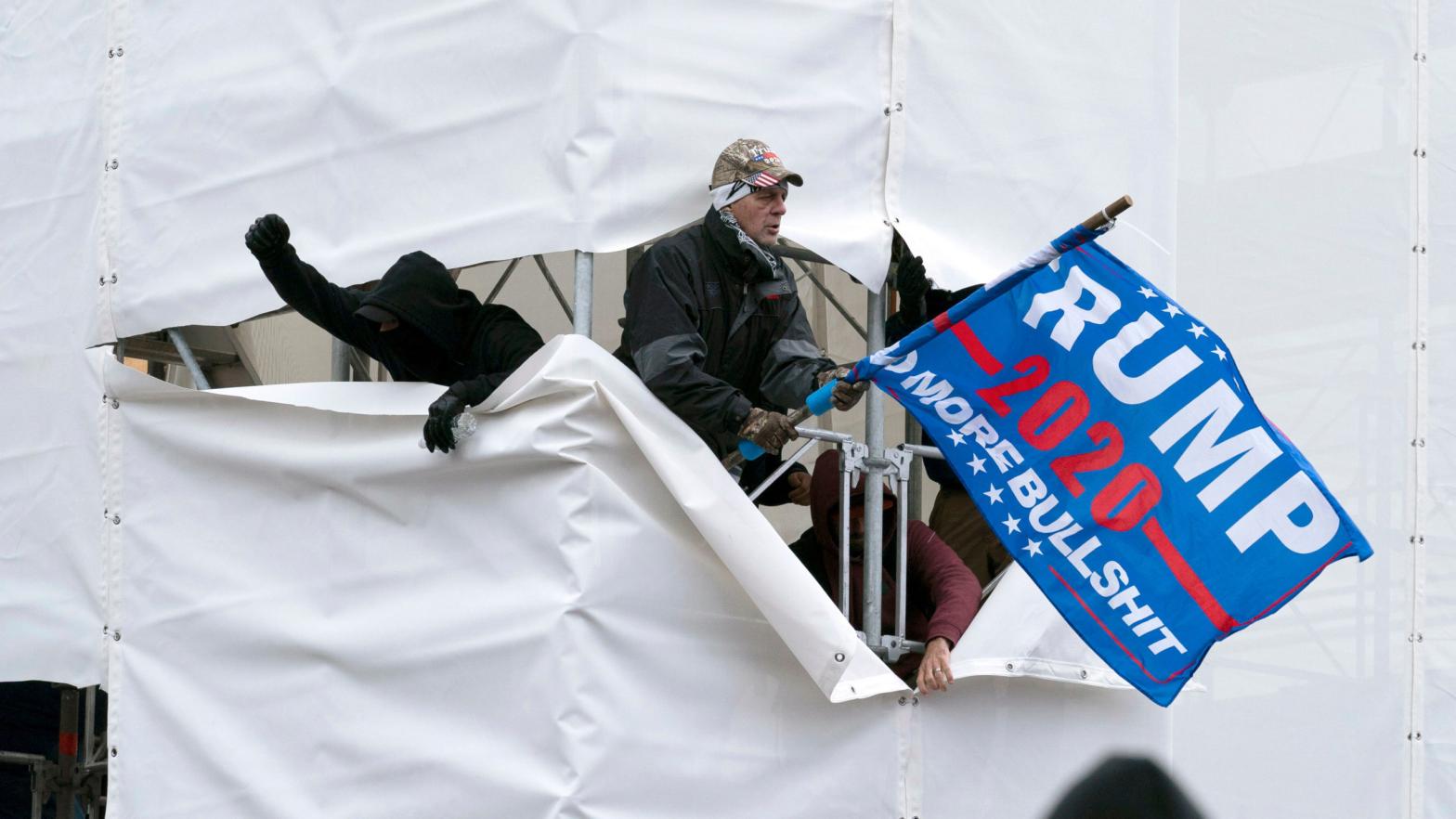 Trump supporters are seen outside the Capitol, Wednesday, Jan. 6, 2021,  in Washington. As Congress prepares to affirm President-elect Joe  Biden's victory, thousands of people have gathered to show their support  for President Donald Trump and his claims of election fraud. (Photo: Jose Luis Magana, AP)