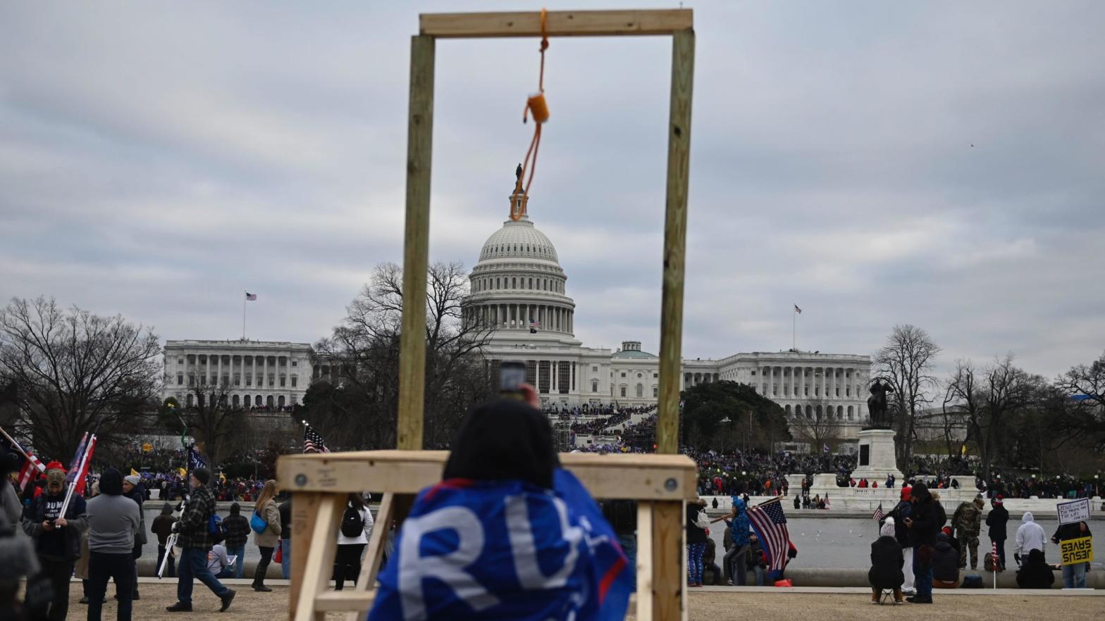 A gallows erected by Trump-supporting violent extremists in front of the Capitol. (Photo: Andrew Caballero-Reynolds/AFP, Getty Images)