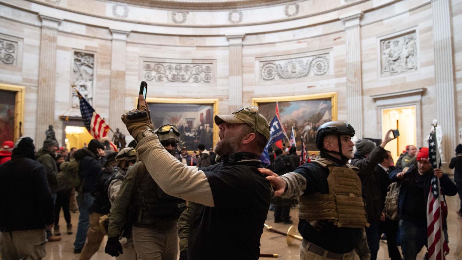Extremists in the U.S. Capitol building after overrunning police. (Photo: Saul Loeb/AFP, Getty Images)